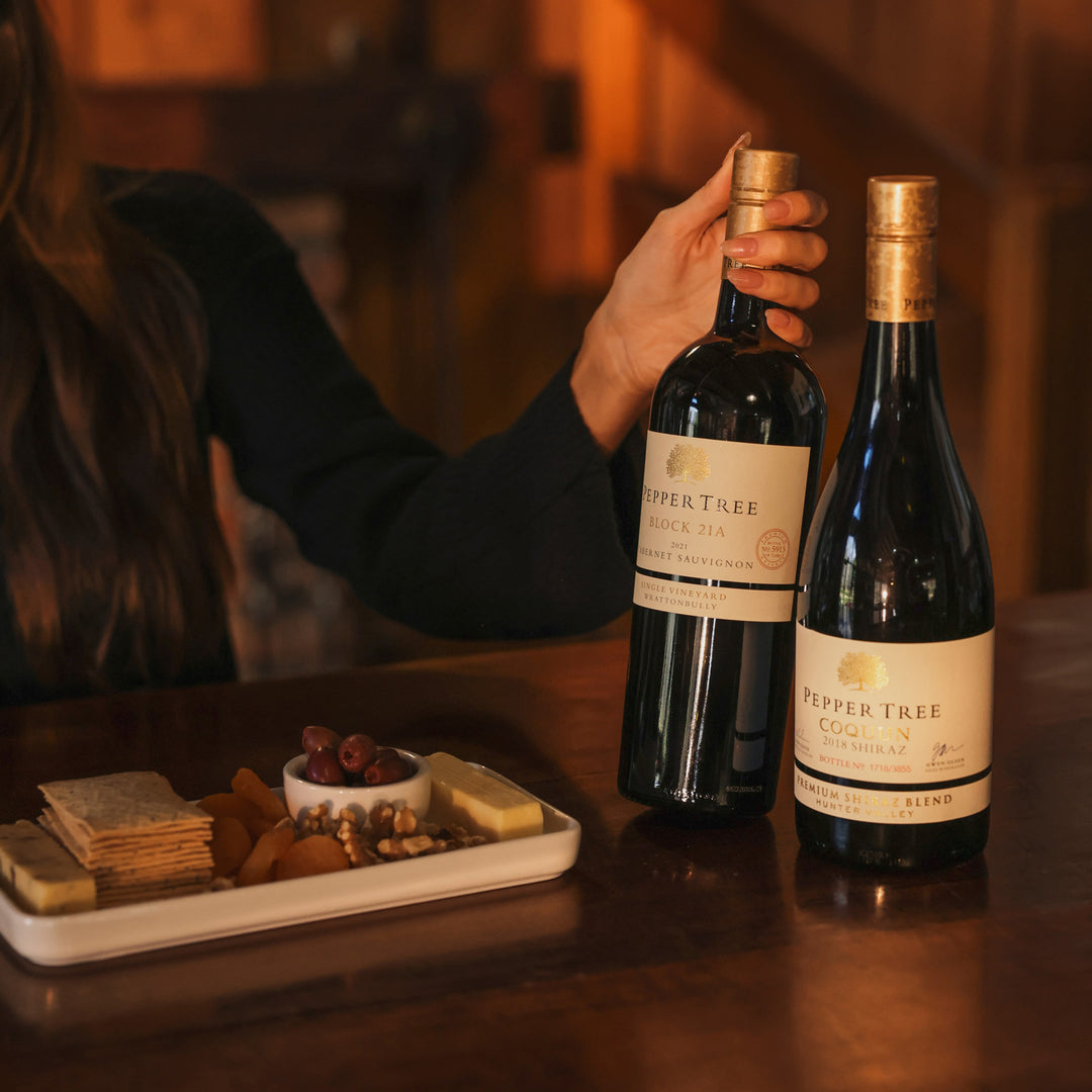 Red wines & cheese by the fire in Pokolbin