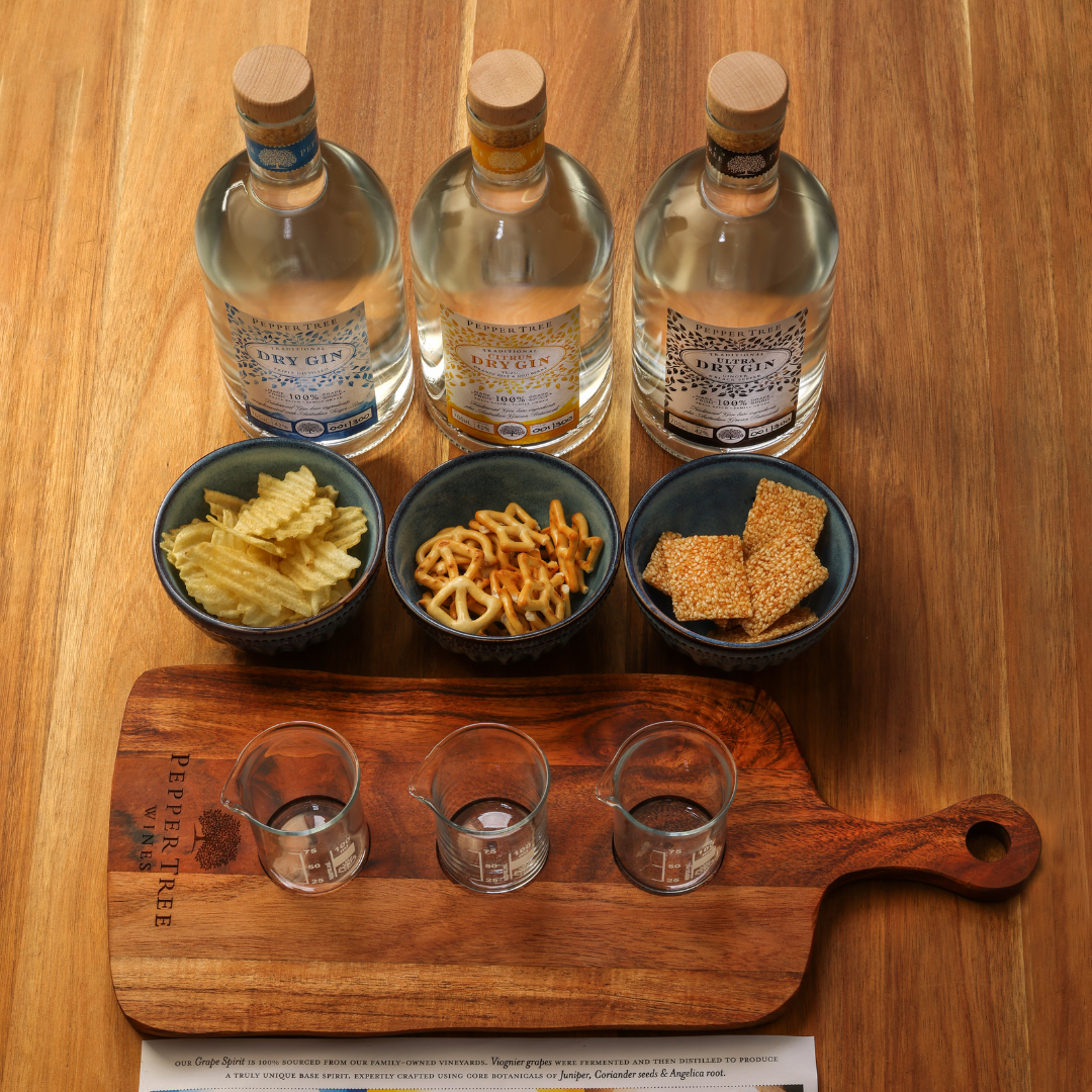 Three Pepper Tree Gins, with recommended snacks for the Pepper Tree Gin Tasting Experience
